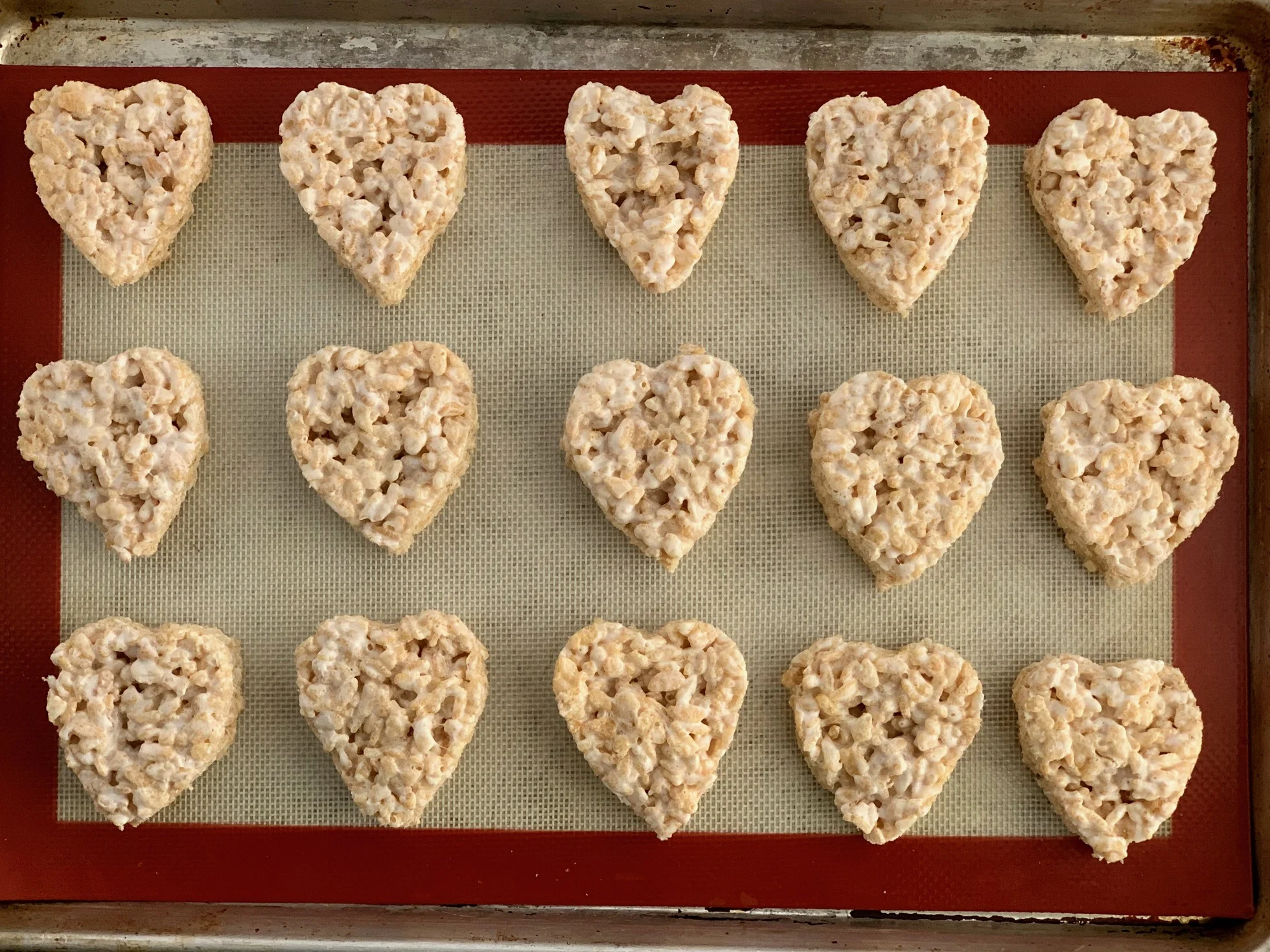 RIce Krispies cut out with a heart shaped cookie cutter.