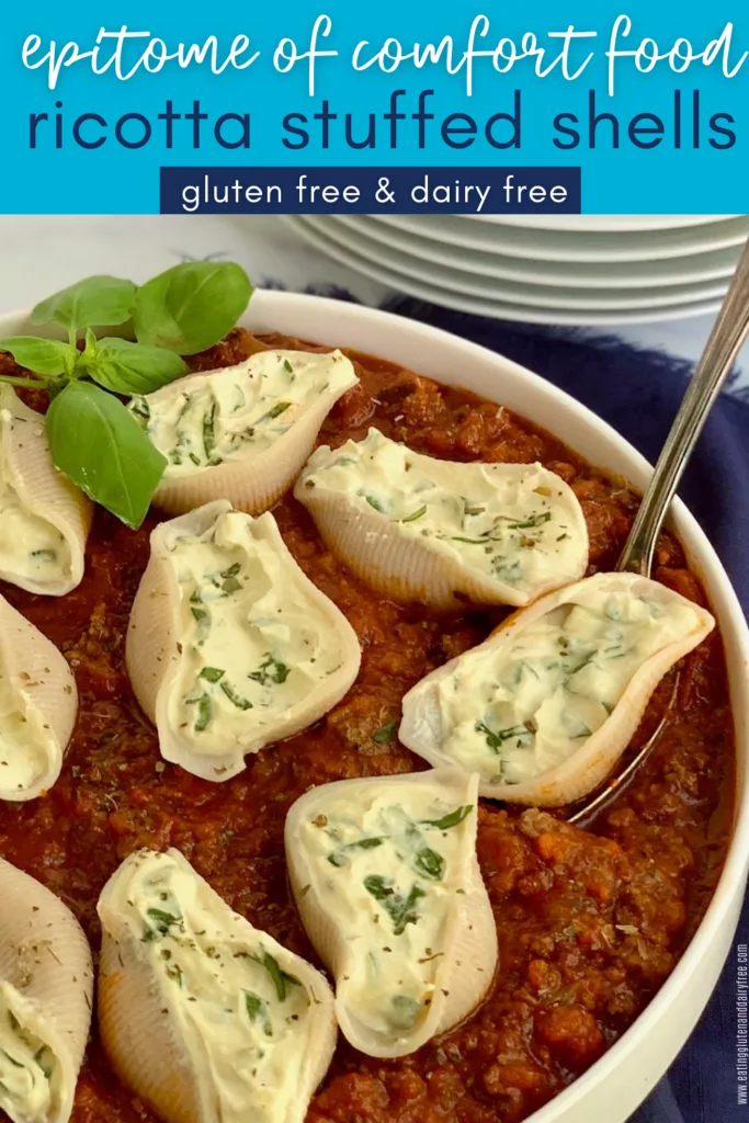 A serving platter full of delicious looking ricotta stuffed shells.