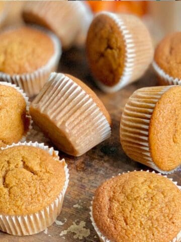 Delicious gluten and dairy free muffins on a wooden surface.