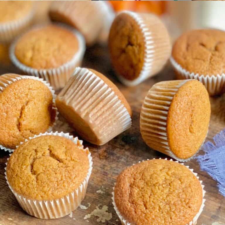 Delicious gluten and dairy free muffins on a wooden surface.