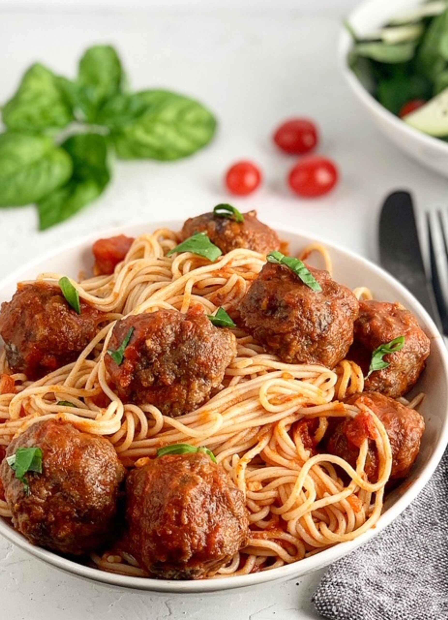 A bowl of gluten free spaghetti with Homemade Italian Meatballs.