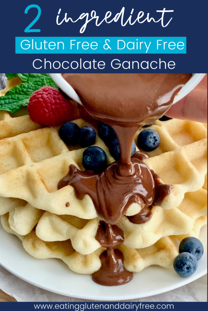 Warm chocolate ganache pouring onto fluffy waffles with blueberries and raspberries in the background