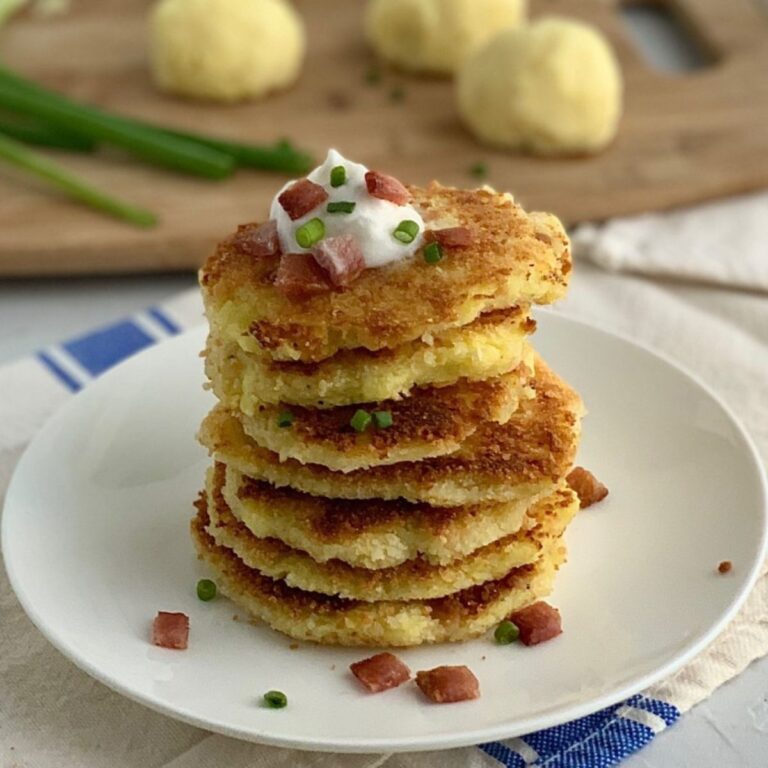 A plate of mashed gluten free potato pancakes.