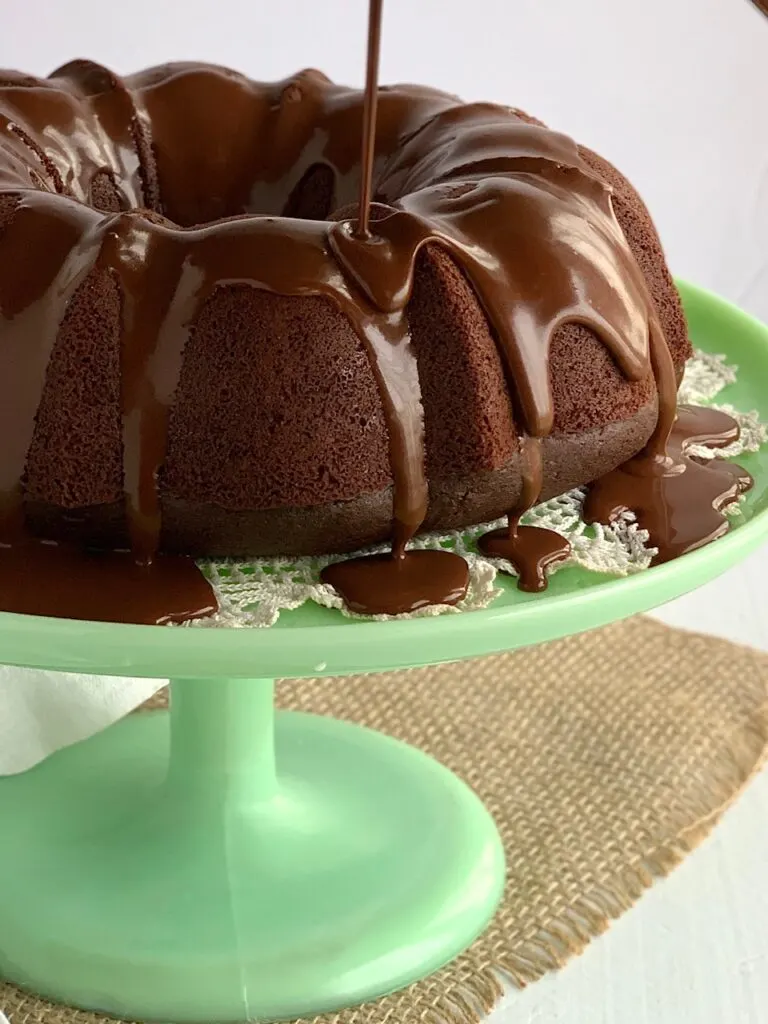 chocolate ganache drizzle on a chocolate fudge bundt cake