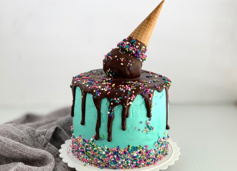 birthday cake with an ice cream cone on top