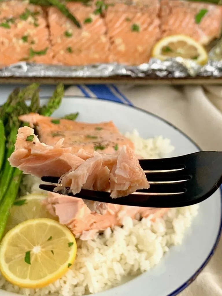 Flaky salmon on a fork