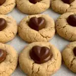 Heart Peanut Butter Blossom Cookies on a baking pan