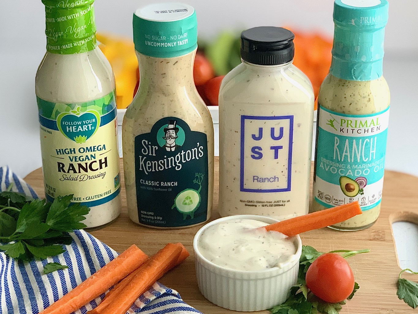 Four bottles of different dairy free ranch dressing