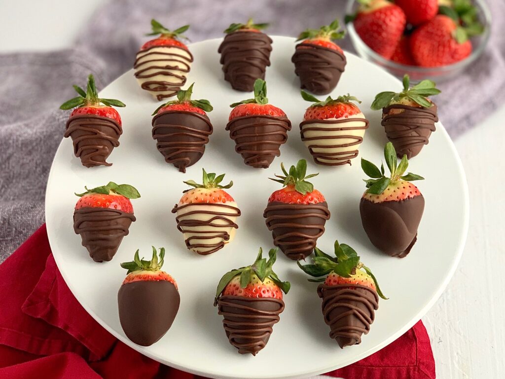 Chocolate covered strawberries on a platter