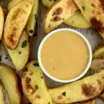 Chick-Fil-A Sauce on a sheet pan with baked potato wedges