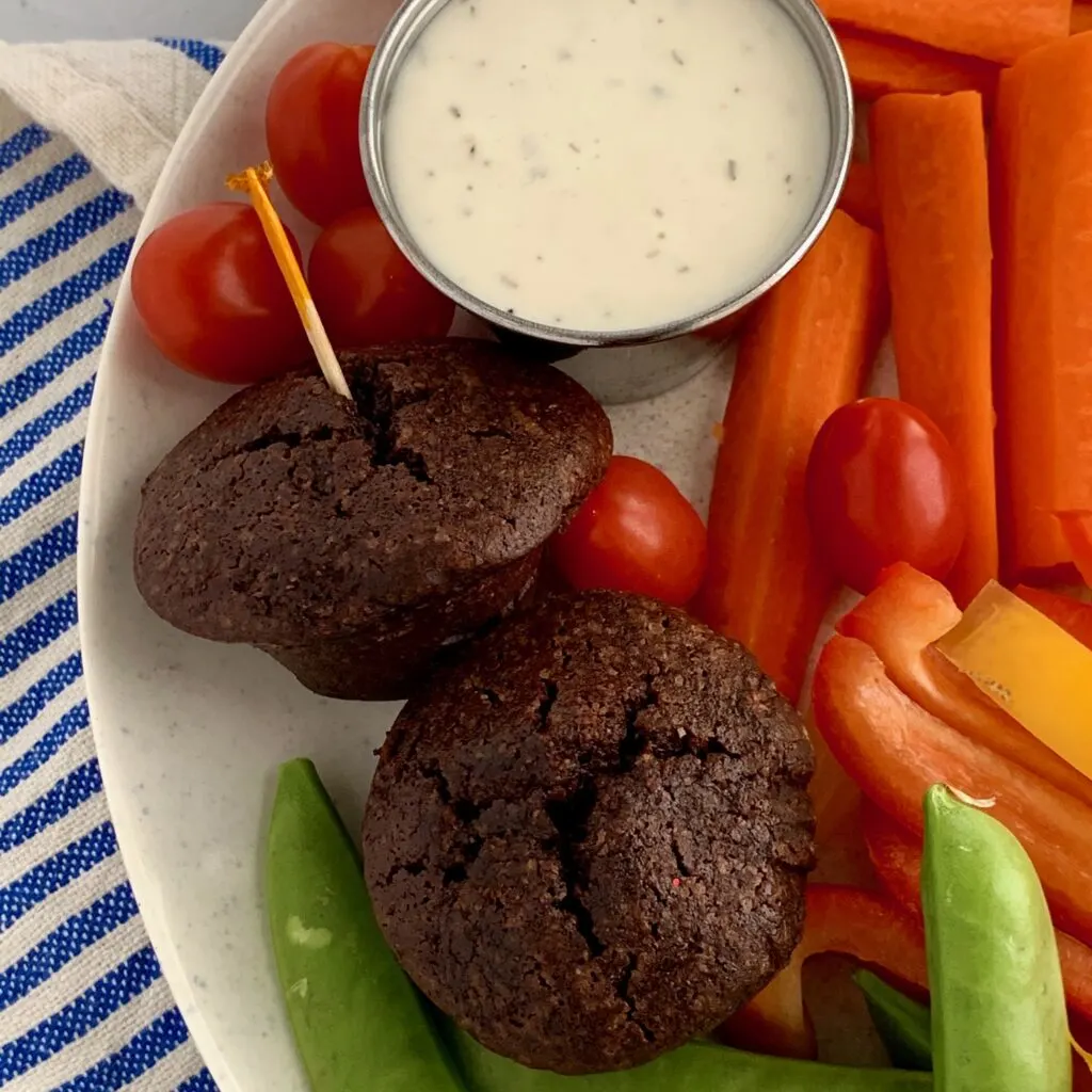 Several kid friendly snack ideas on a plate with Just Ranch dipping sauce