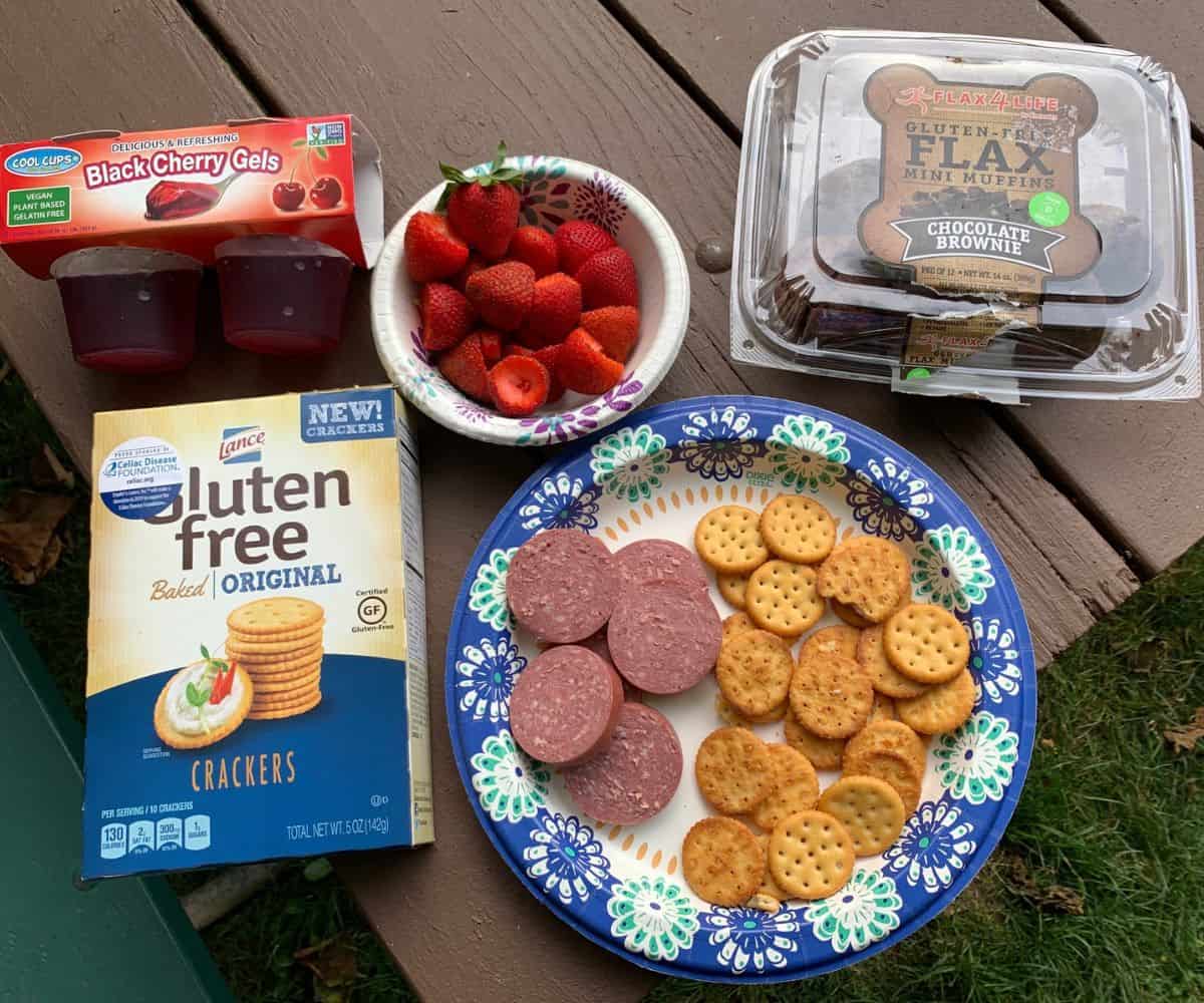 Camping snacks on a picnic table.