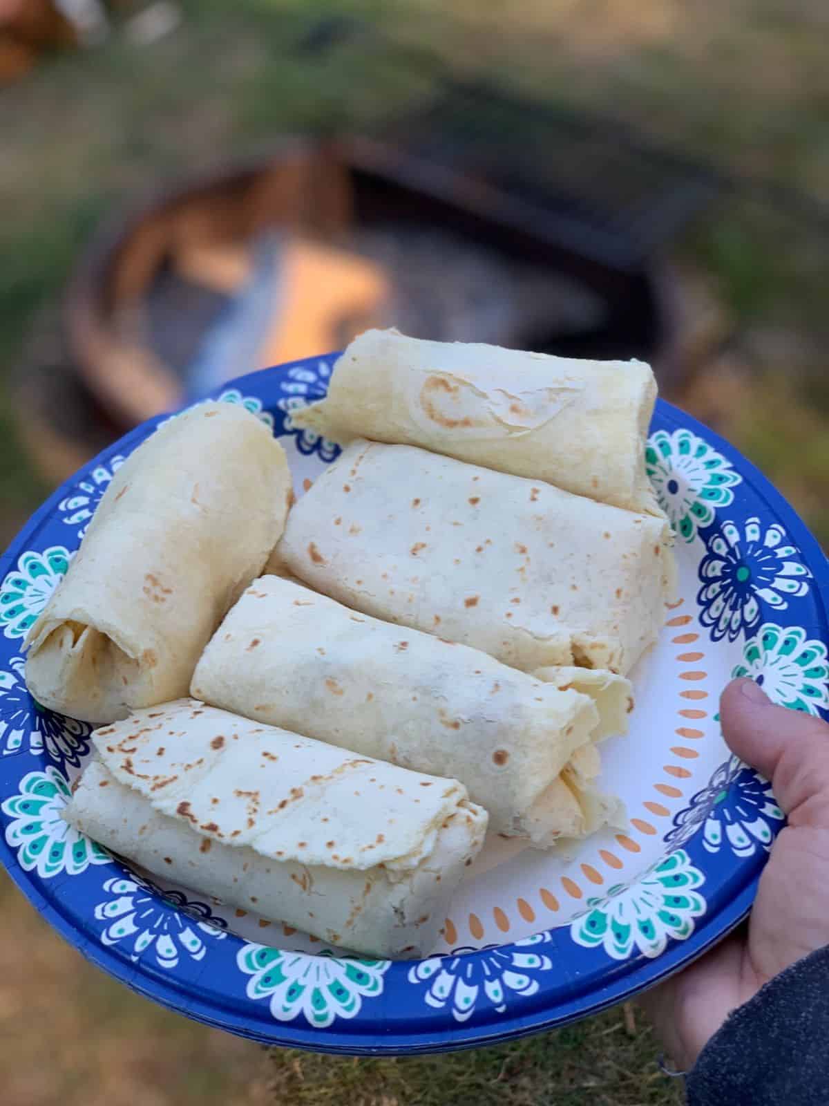 A plate of breakfast burritos.