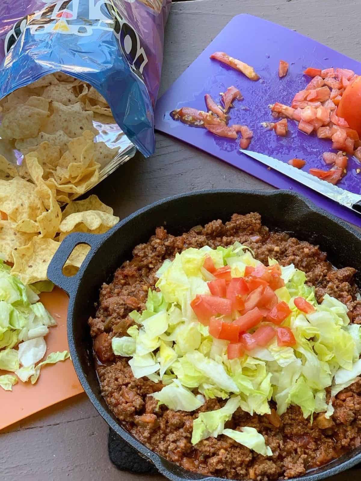 A Taco skillet on a picnic table.