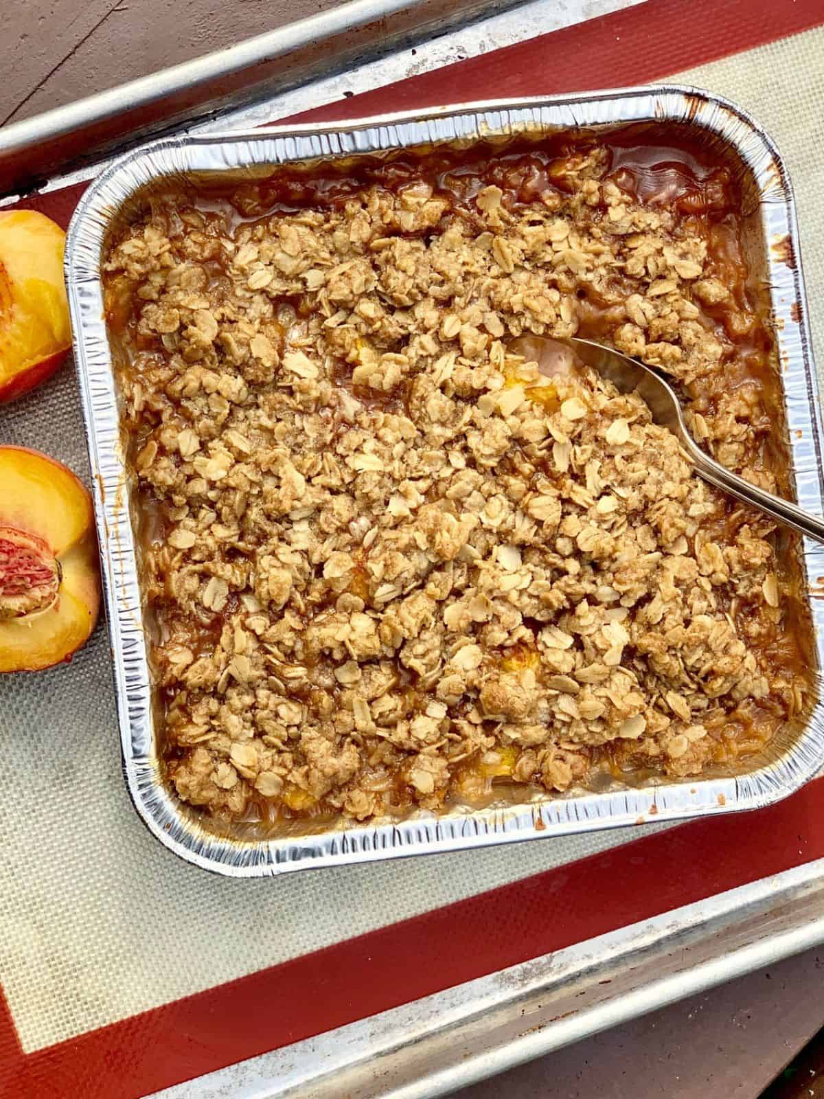 A camping dessert in a foil pan.