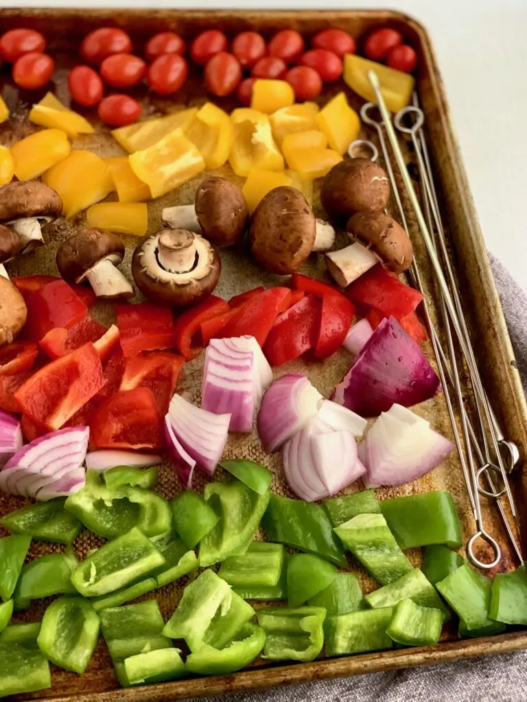 Veggies cut up on a baking sheet