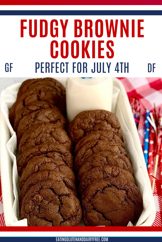 Fudgy brownie cookies in a baking pan with a glass of dairy free milk.