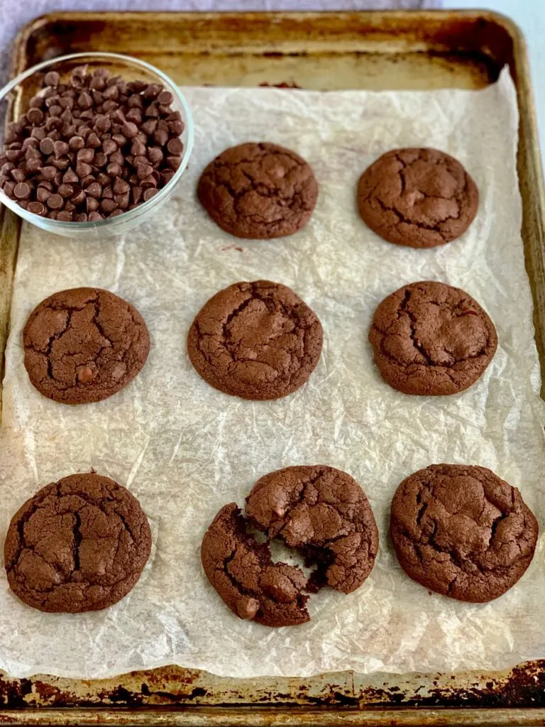 Fudgy brownie cookies on a baking sheet.