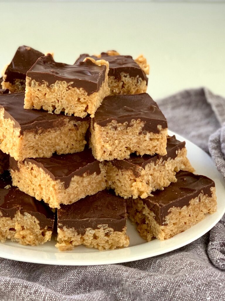 A plate of Oh Henry Bars stacked on top of each other. 