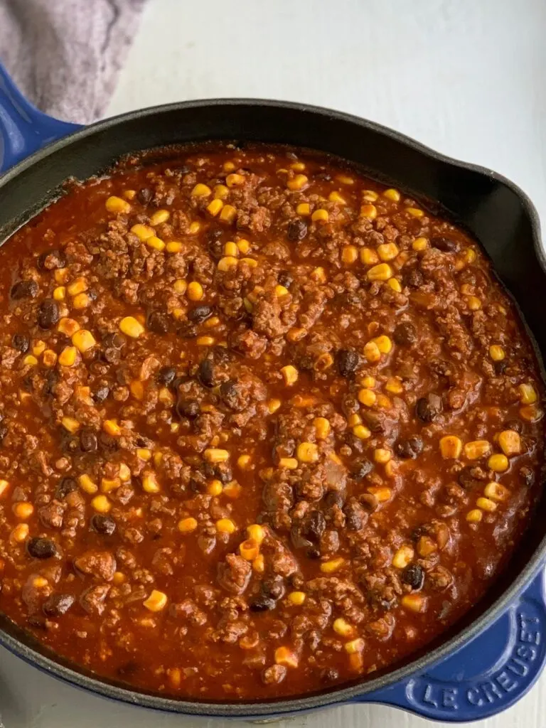 A saucy mixture of ground beef, corn, black beans, and sauces. 