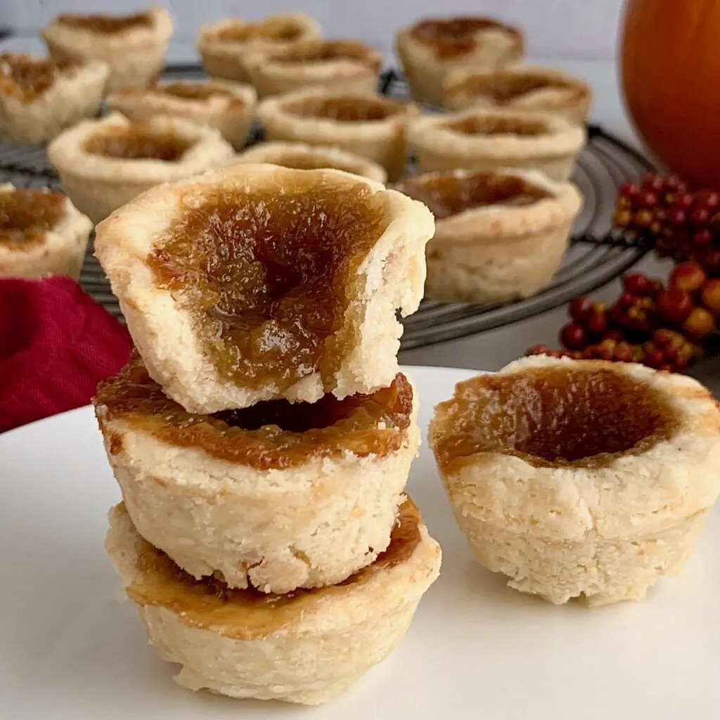 3 butter tarts stacked on top of each other