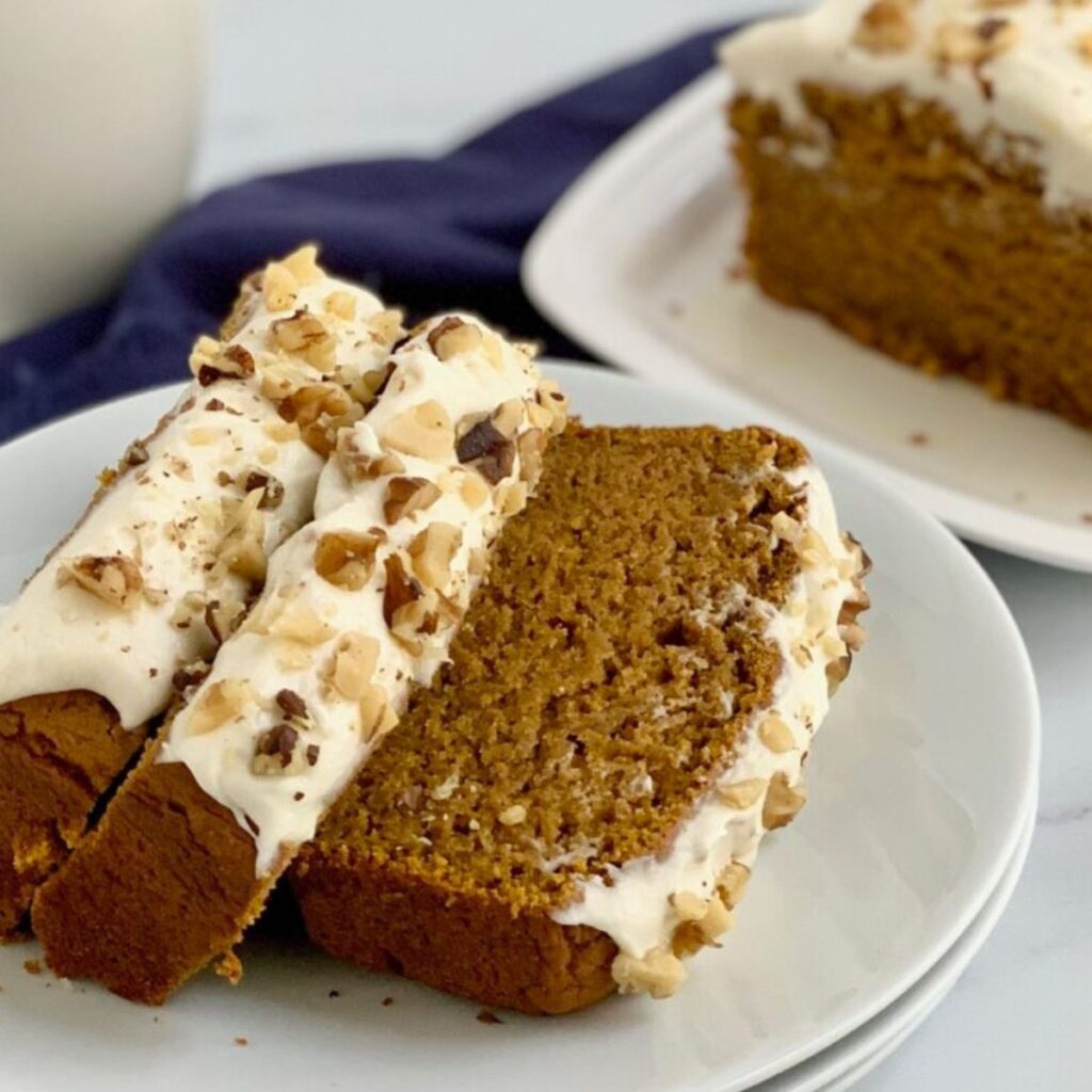 A few slices of dairy free pumpkin bread with frosting.
