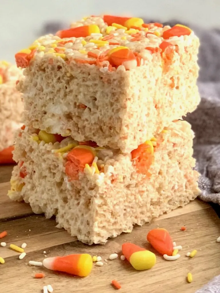 a stack of rice krispies with candy corns on top