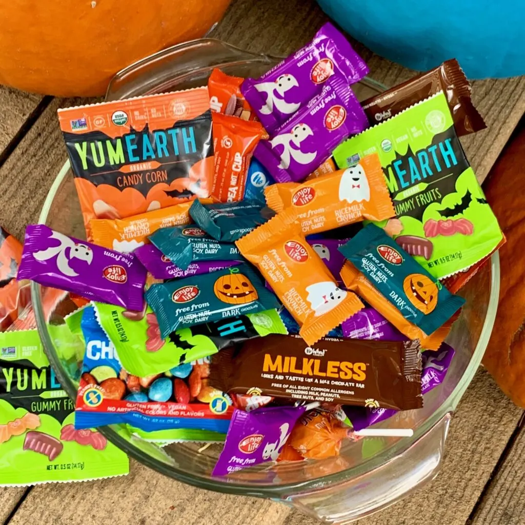 a bowl stashed with prepackaged Halloween candy