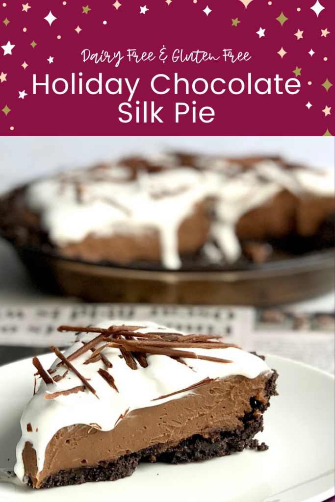 A slice of pie with an oreo crust, chocolate cream filling, whipped topping, and chocolate shavings.