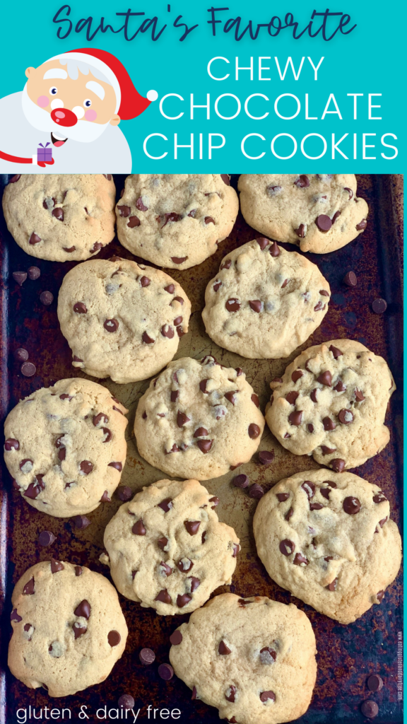 Warm chocolate chip cookies on a baking sheet.