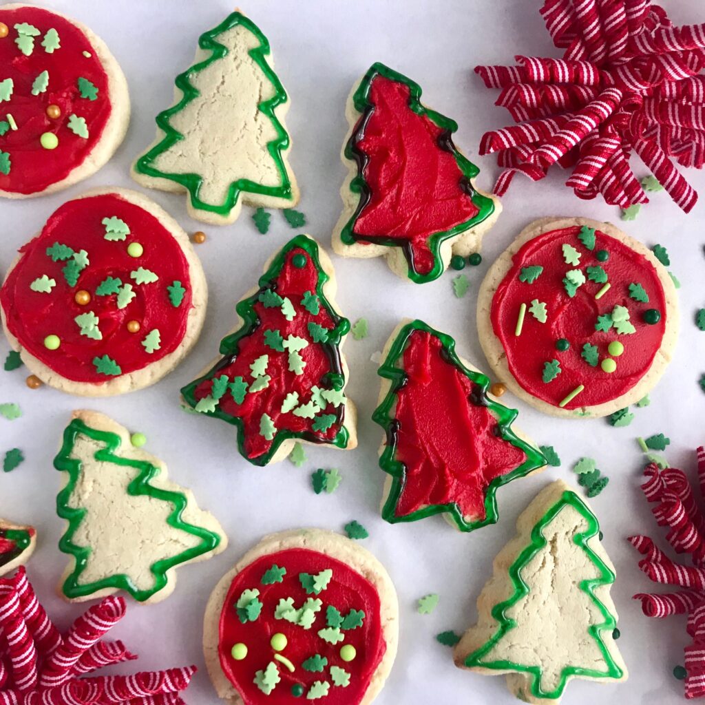Different size Christmas themed sugar cookies