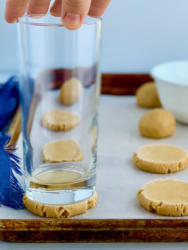 A glass on top of a cookie-- flattening it