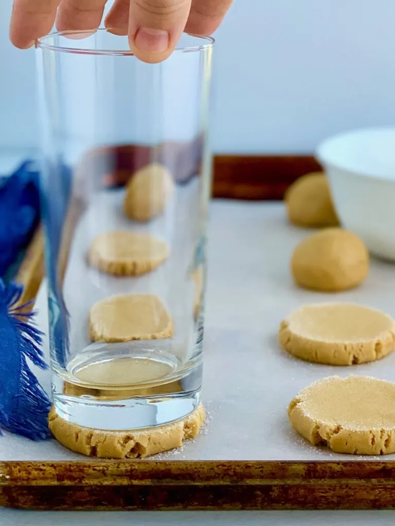 A glass on top of a cookie-- flattening it