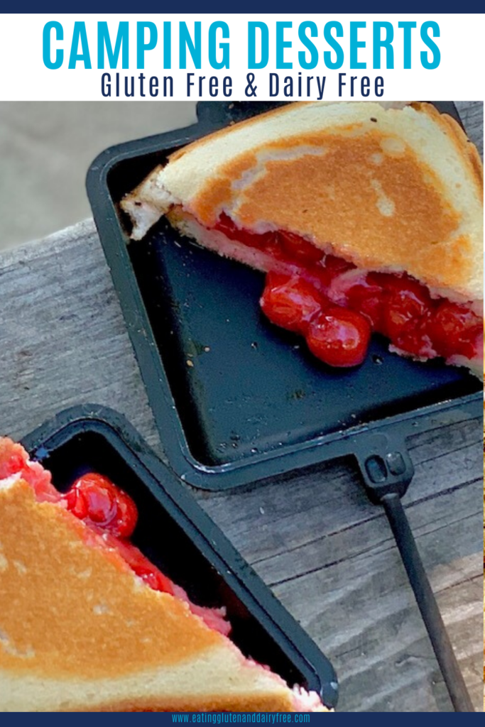 Black square mountain pie maker with sandwich bread and cherry pie filling.