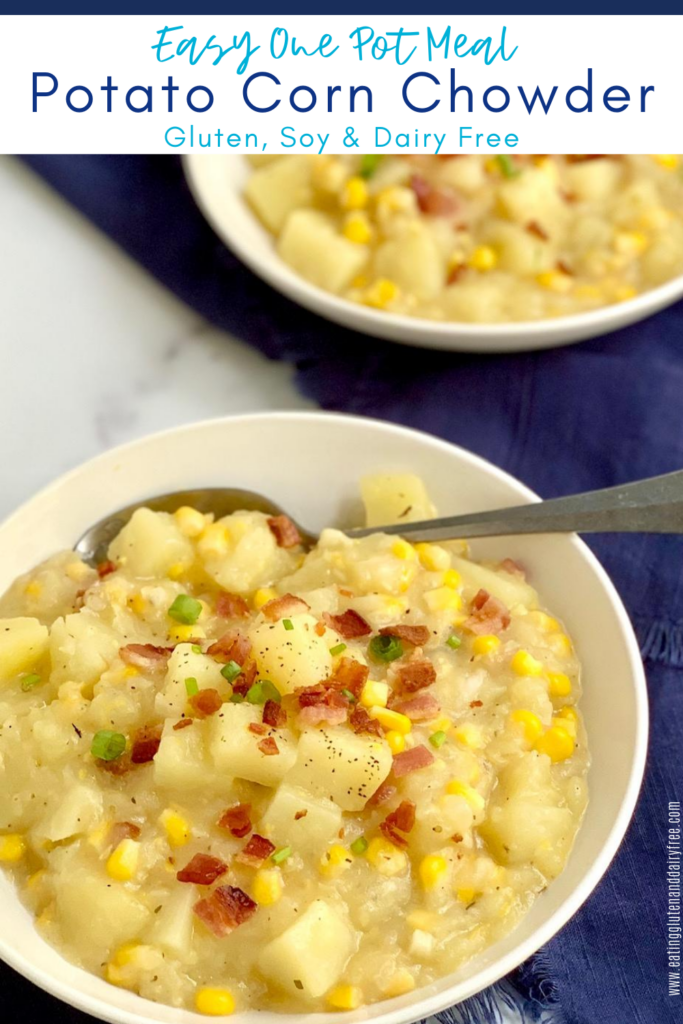A white soup bowl filled with chunks of tender potatoes and sweet yellow corn in a thickened chowder. Garnished with bacon bits and sliced green onions.