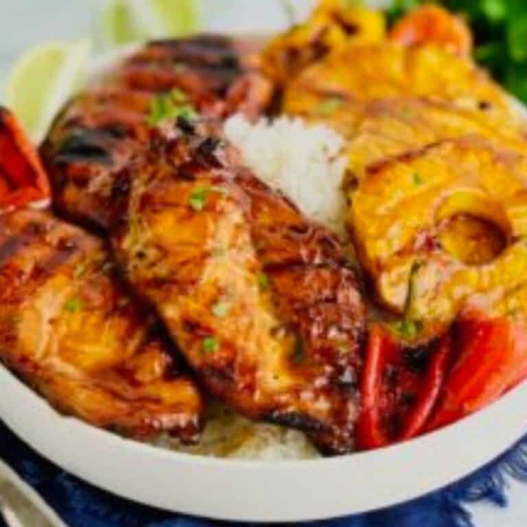 A serving bowl of rice and Gluten Free Chicken Teriyaki.