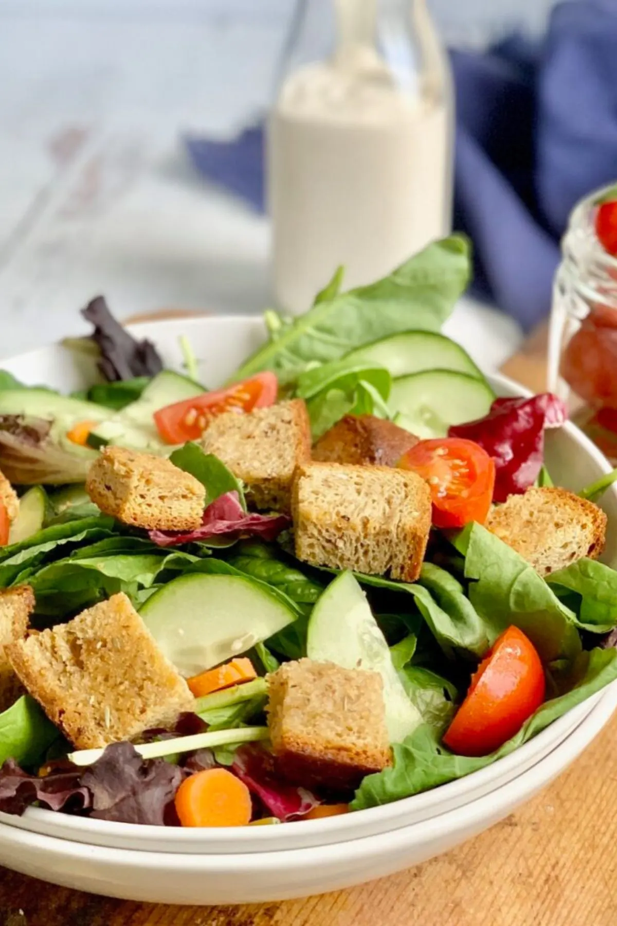 A gluten and dairy free salad with homemade gluten and dairy free croutons on top.