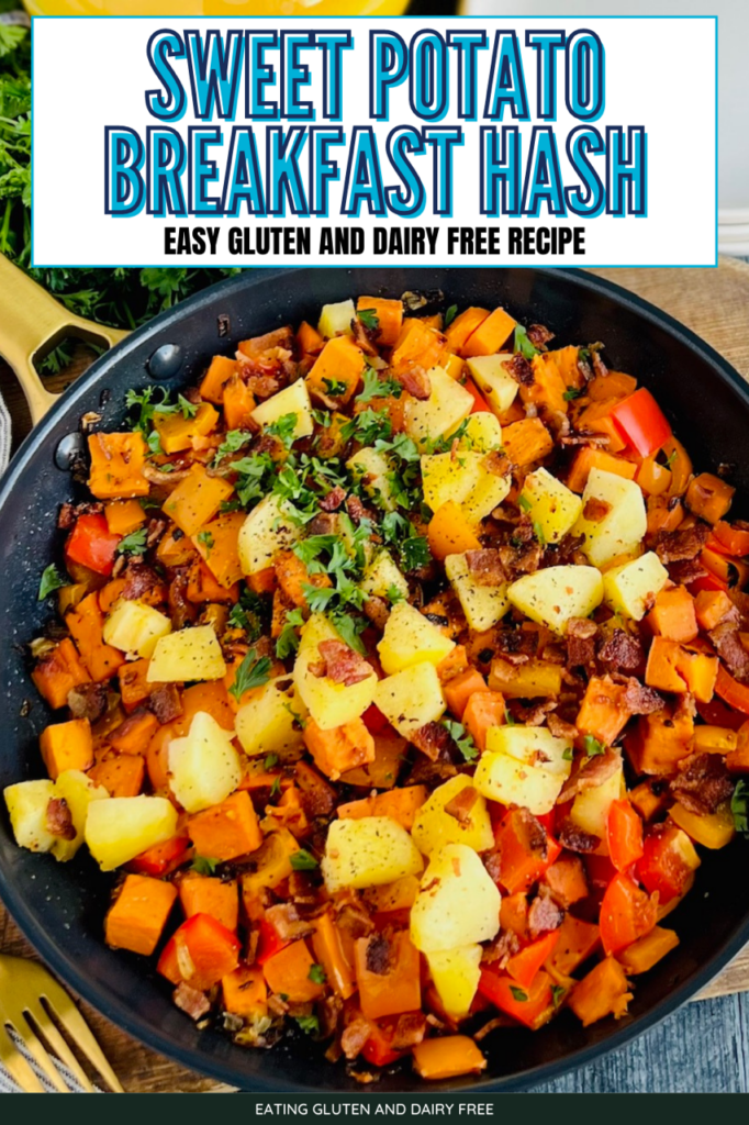 A black frying pan packed with sautÃ©ed sweet potatoes, diced apples, red and orange bell peppers, and topped with bits of bacon and Italian parsley next to white breakfast plates. 