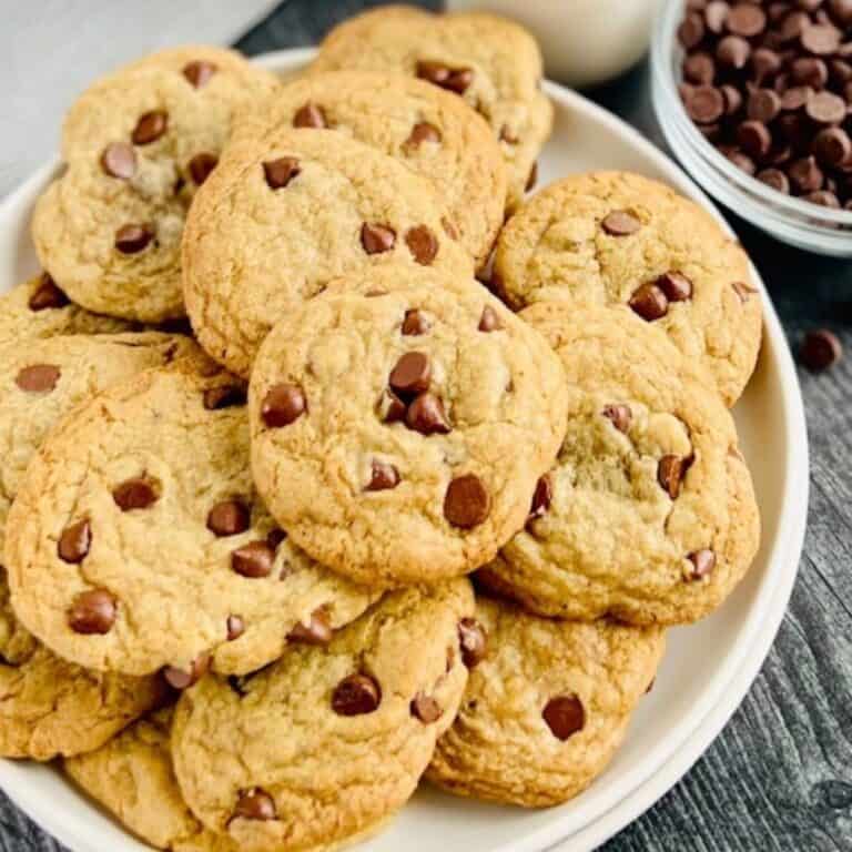 Delicious gluten and dairy free chocolate chip cookies on a white plate.