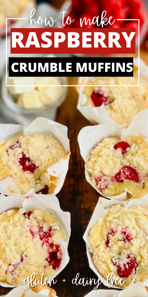Light colored muffins with speckles of red raspberries popping through next to a bowl of butter.