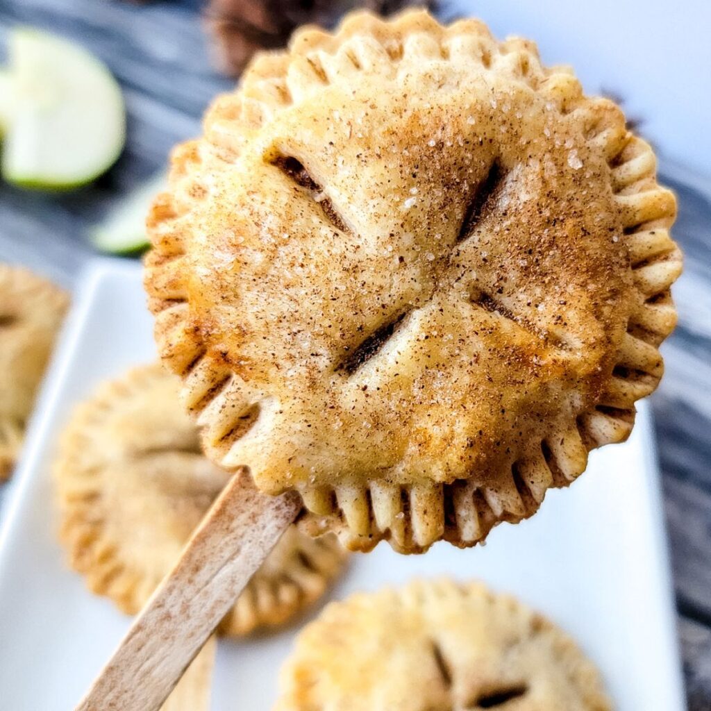 Close up of a Apple Pie pop with slits in it.