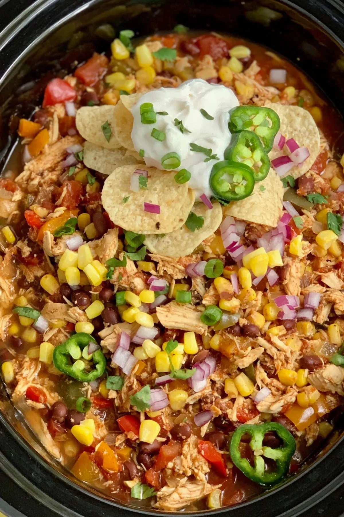 A crockpot bowl of taco soup.