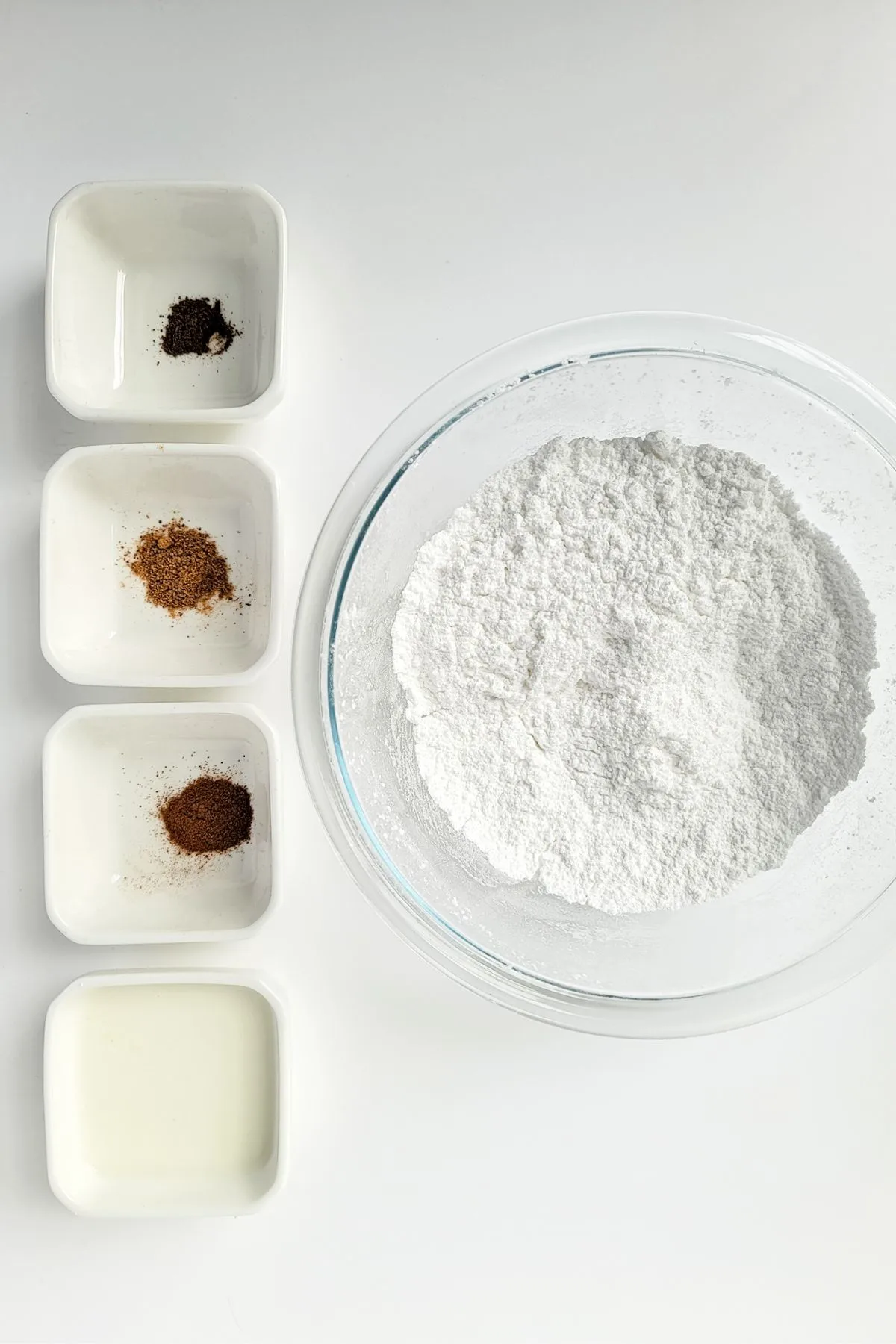 Ingredients needed to make homemade sugar and cinnamon glaze.