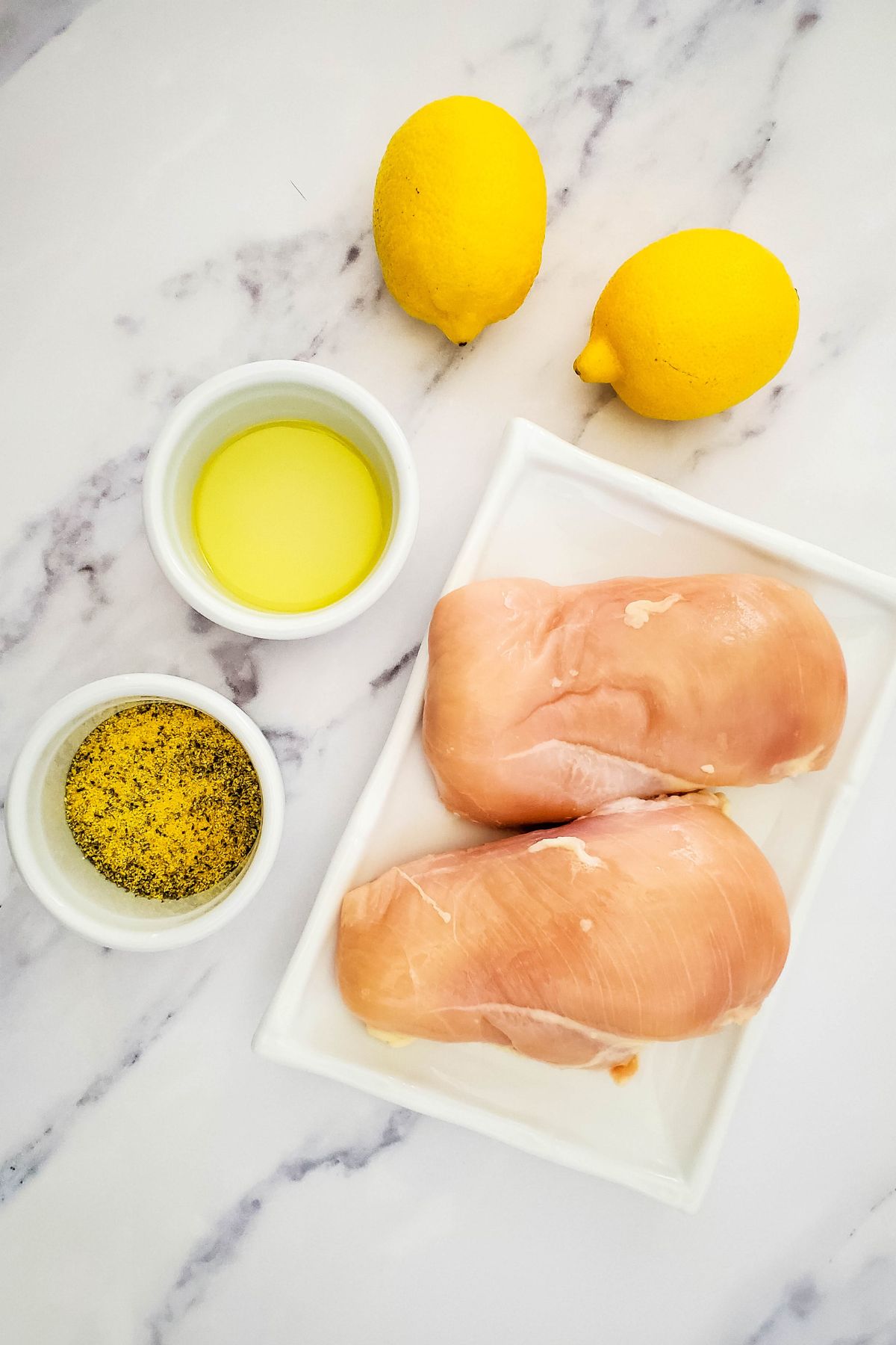 Ingredients needed to make lemon pepper chicken.