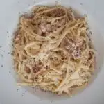 Looking down on a bowl of pasta carbonara.