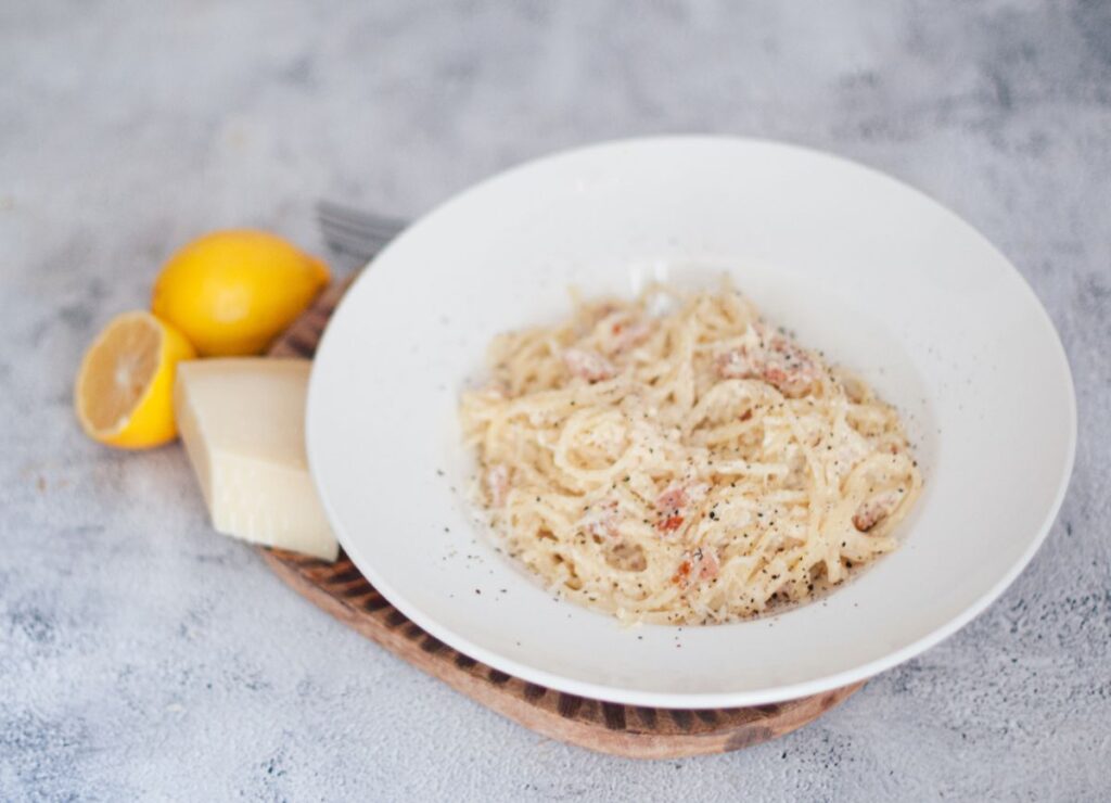 Plate of spaghetti carbonara with gluten free pasta.