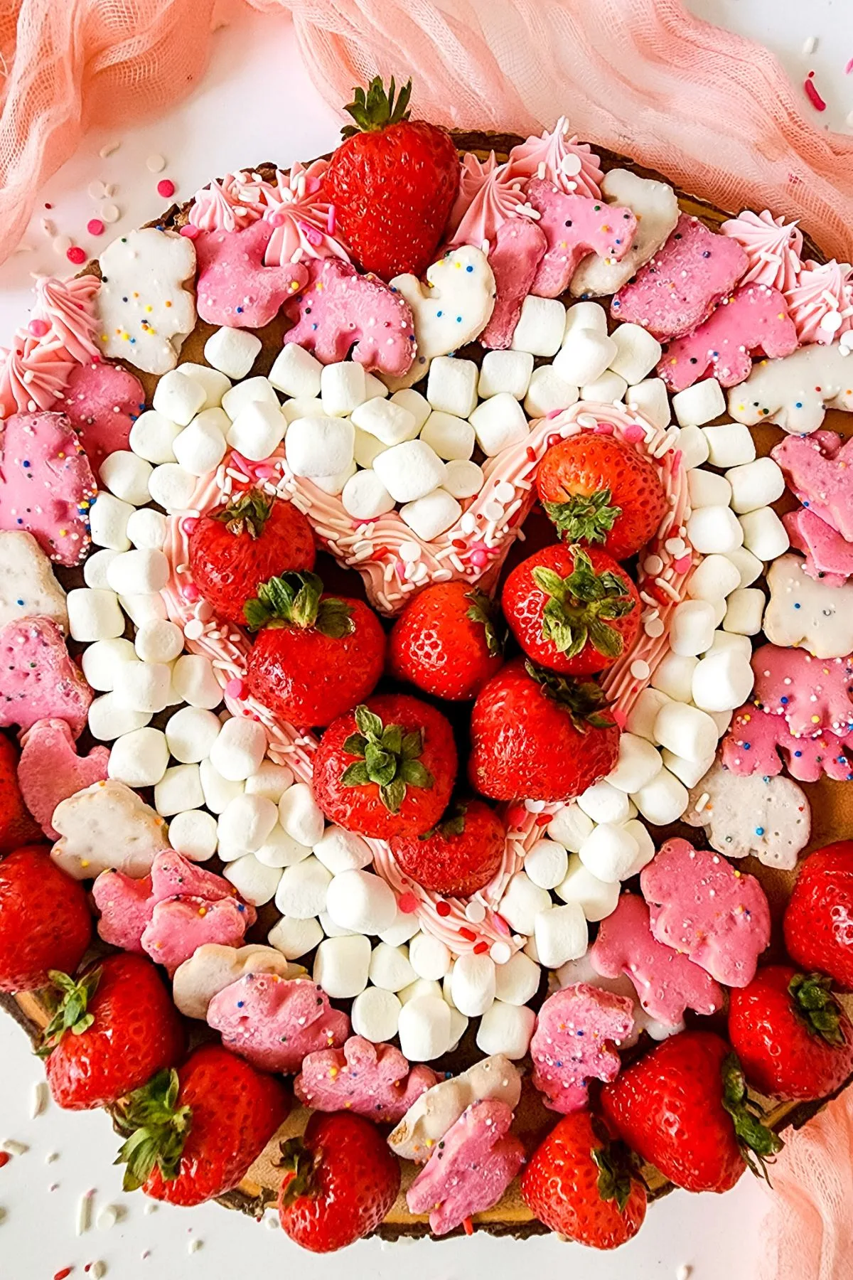 Desserts arranged in the shape of a Valentine's Day heart.