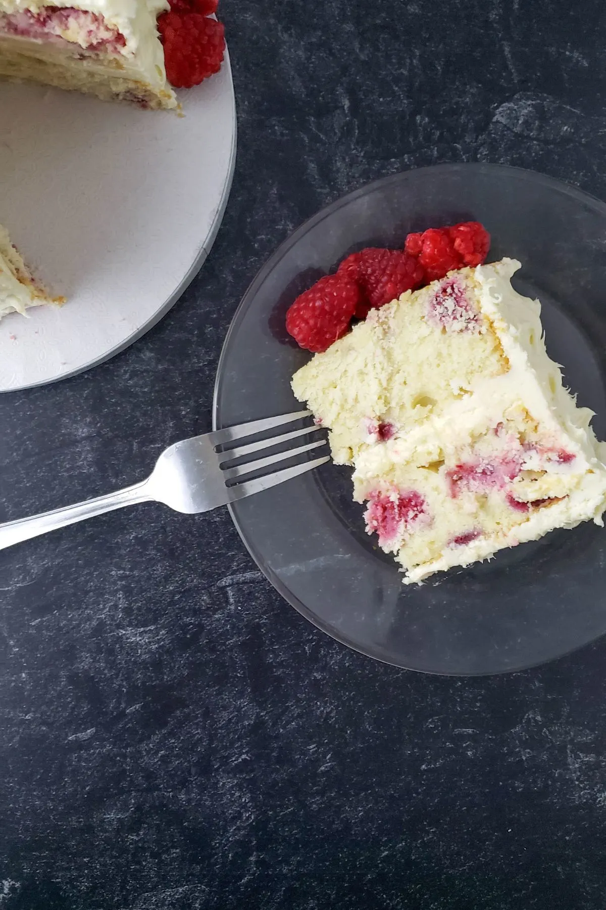 A slice of raspberry lemon cake. 