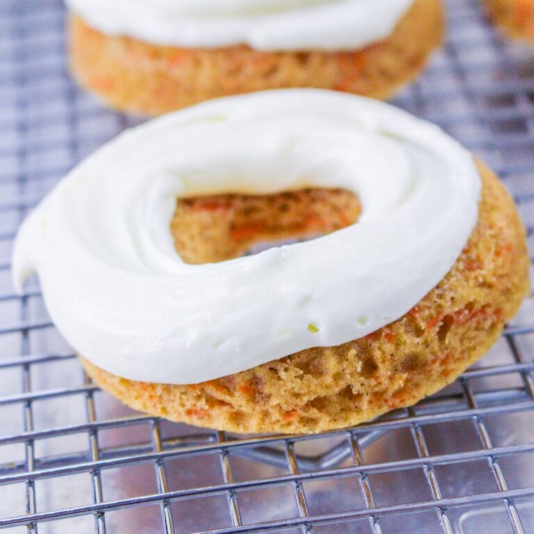 Close up looking at a carrot cake donut.