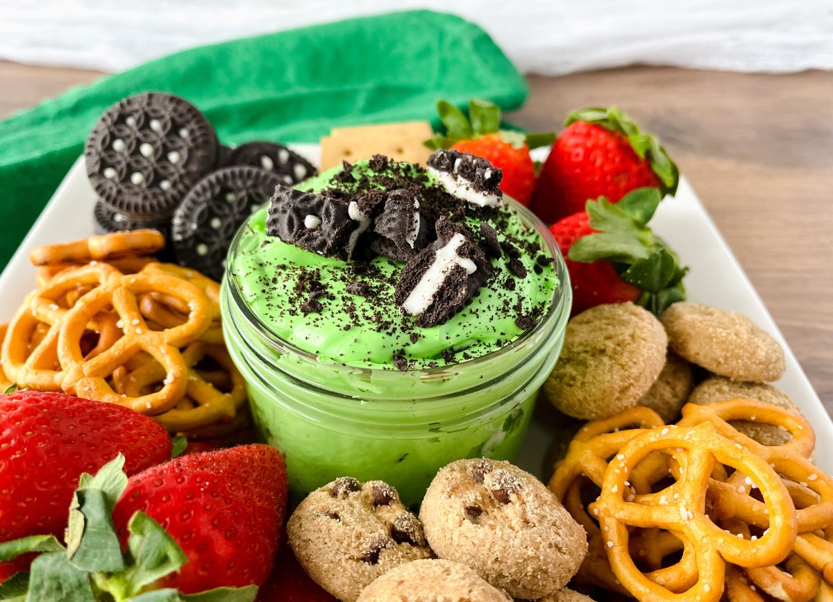 Green dessert dip with dairy free treats.